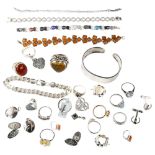 Various silver jewellery, including torque bangle, amber bracelet, rings etc, 229g gross Lot sold as