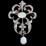 A late 20th century 9ct white gold opal and diamond openwork pendant/brooch, in Art Nouveau style,