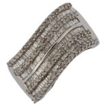 A modern 9ct white gold diamond cluster band ring, set with baguette and single-cut diamonds,