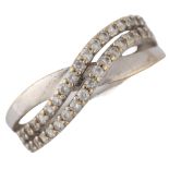 A 9ct white gold cubic zirconia crossover ring, setting height 6.1mm, size M, 1.5g No damage or