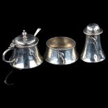 FROM THE BRIT EKLAND COLLECTION - an Art Nouveau George V silver 3-piece cruet set, comprising