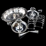 Various silver plate, including pair of chambersticks, toast racks etc Lot sold as seen unless