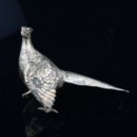 An Elizabeth II silver desk model pheasant, maker's marks LAG, hallmarks London 1965, length 14cm,
