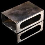 An Edwardian silver matchbox holder, by William Comyns, hallmarks Birmingham 1909, 8cm x 5cm, 2.