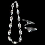HERMANN SIERSBOL - a Danish modernist sterling silver matching necklace and pair of brooches set,