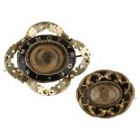 2 Victorian mourning brooches, gilt-metal settings with enamel decoration and hair plaques,