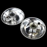 A pair of silver plated chambersticks with gadrooned rims, diameter 19cm Rims slightly bent, bowls