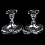 A matched pair of Neo-Classical style silver squat table candlesticks, by Lambert & Co and