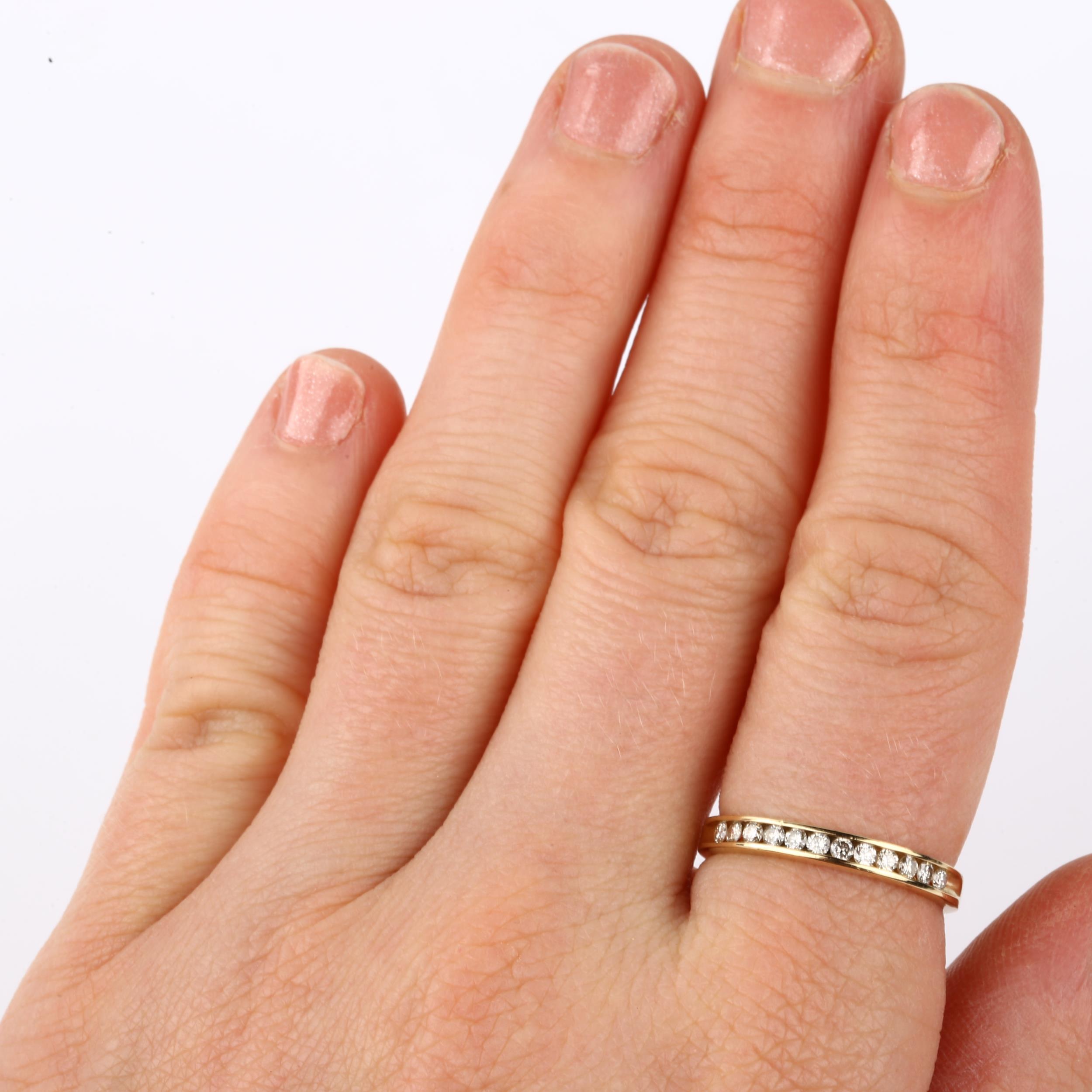 A modern 9ct gold diamond half eternity ring, channel set with modern round brilliant-cut - Image 4 of 4