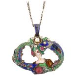 A large late 19th century Austro-Hungarian silver ruby pearl and enamel figural pendant necklace,