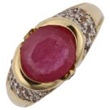 A modern 9ct gold ruby and white sapphire dress ring, setting height 10.2mm, size P, 5.1g No