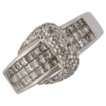 A heavy 18ct white gold diamond belt buckle ring, set with Princess and modern round brilliant-cut