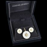 GEORG JENSEN - a Danish vermeil sterling silver and white enamel daisy pattern matching pendant