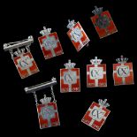 GEORG JENSEN - 9 Danish sterling silver and red enamel Kingmark badges and brooches, height 23.
