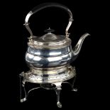 A George V silver kettle on stand, with ebonised handle and finial, by Harrison Brothers and Howson,