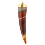 A late 20th century banded agate tooth pendant, Continental yellow metal mount, pendant height