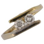 A Continental 14ct gold two stone diamond crossover ring, set with modern round brilliant-cut