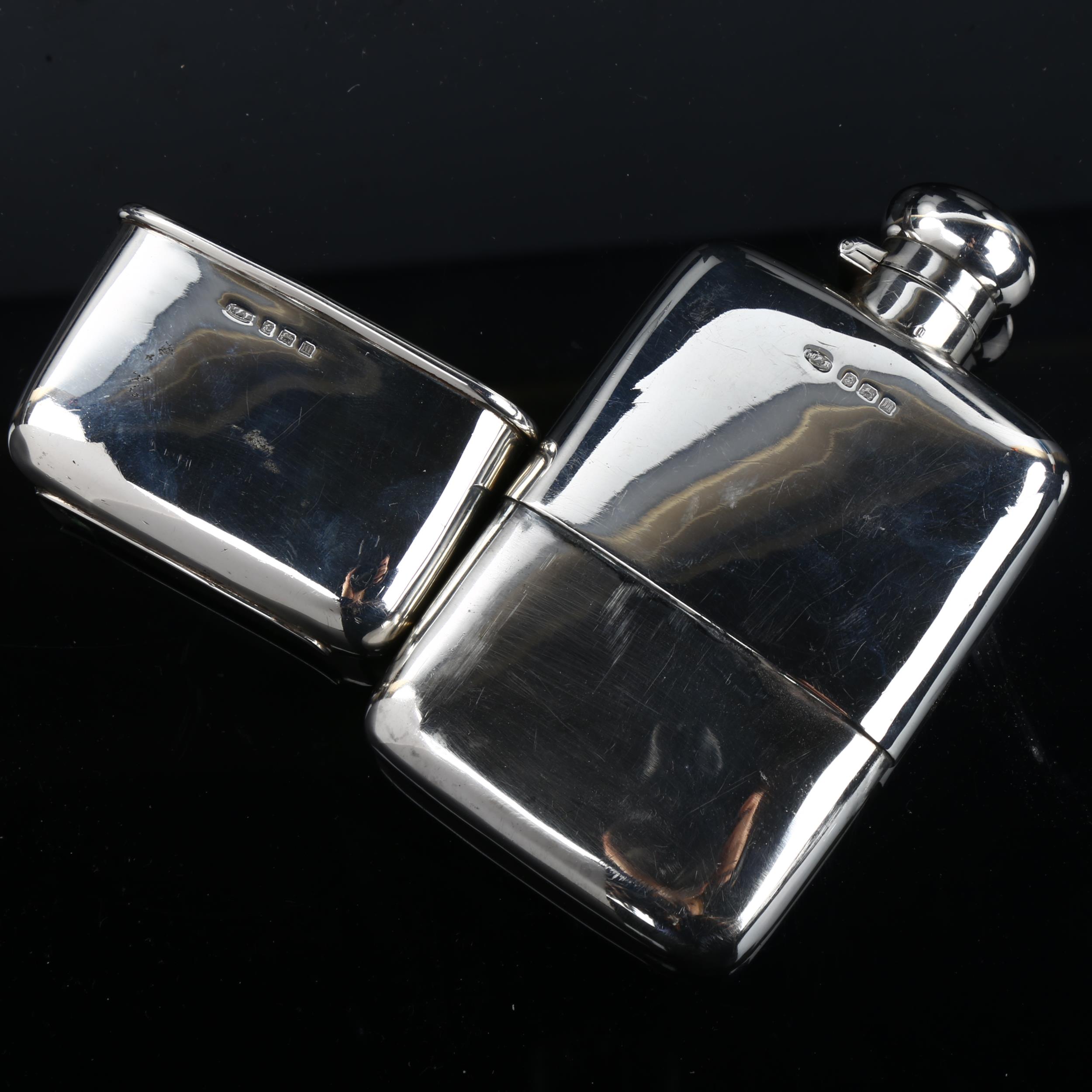 A George V curved silver spirit flask, with screw-lock button cap and removeable beaker with gilt - Image 2 of 3