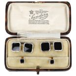 An Art Deco 18ct gold platinum and onyx dress set, comprising pair of cufflinks and pair of dress