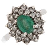 A Continental 18ct white gold emerald and diamond cluster ring, set with oval mixed-cut emerald