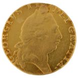 A George III 1793 gold spade guinea coin, diameter 24.4mm, 8.2g Coin has a repaired punch mark for