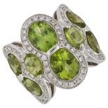 A large Italian 18ct white gold peridot and diamond cluster cocktail ring, set with oval mixed-cut
