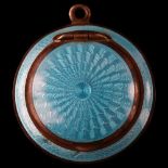 A Continental silver and blue enamel miniature compact, diameter 3cm Underside has 1 large edge chip