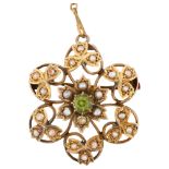 An Art Nouveau peridot and pearl flowerhead openwork brooch, unmarked yellow metal settings,