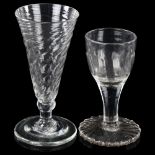 An Antique cordial glass with moulded bowl on heavy foot, height 10cm, and a funnel-shaped glass,