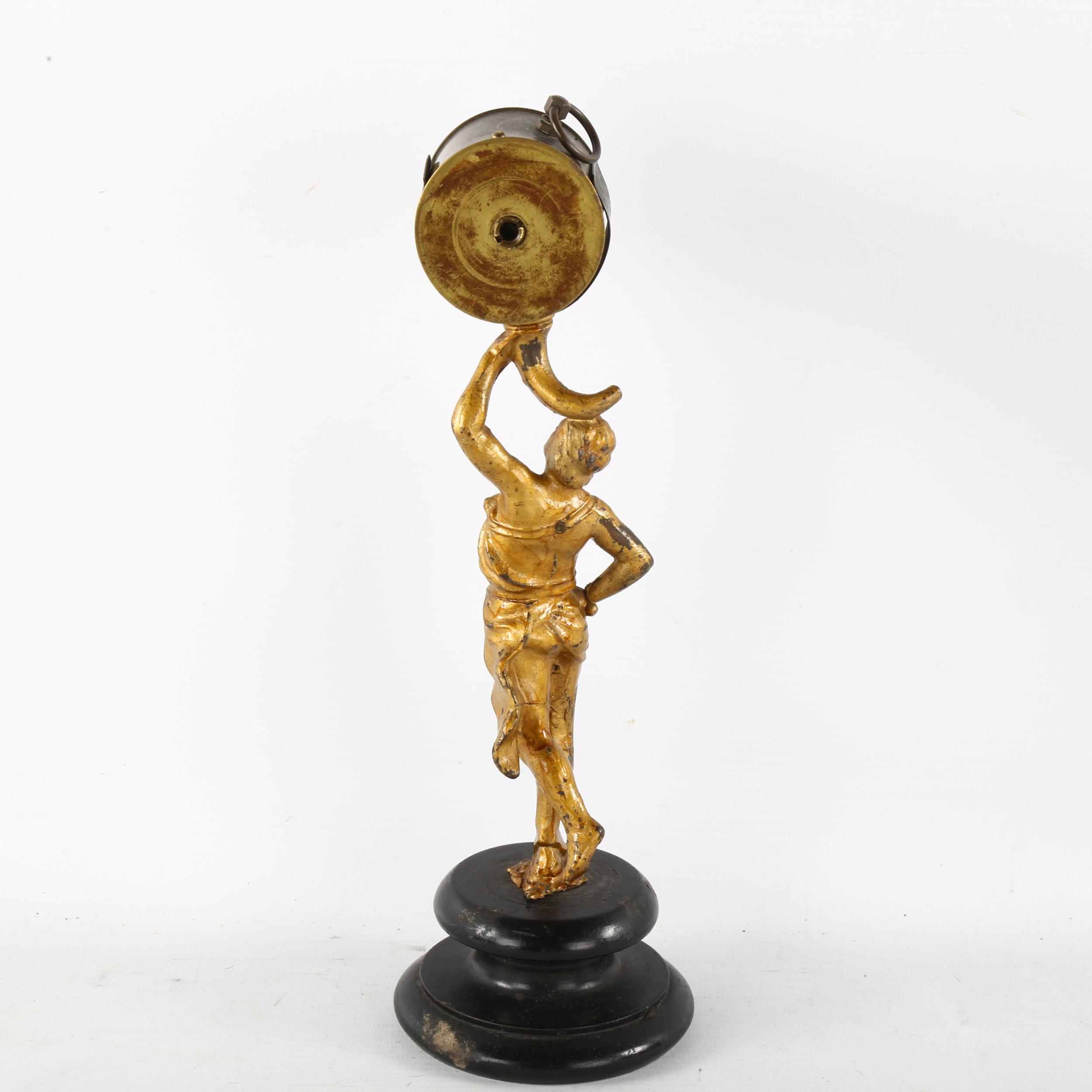 A 19th century novelty clock, supported by gilt-metal figure, height 27cm Gilding on figure is - Image 2 of 3