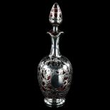 A silver overlay cranberry glass decanter and stopper, height 22cm Good condition, no chips or