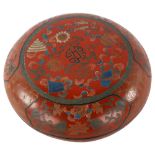 A Chinese red lacquer circular box with painted decoration, diameter 17cm Good condition, a few tiny