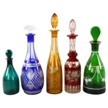 A group of 5 x 19th century coloured glass decanters, largest height 39cm (5) All in good