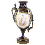 A French blue ground porcelain urn, with hand painted and gilded panels, and gilt-bronze handles and