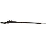 An 18th/19th century Indian Taradar flintlock rifle, length 173cm Well used original condition, no