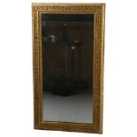 A Victorian gilt-gesso wall mirror, with relief moulded surround, 101cm x 56cm Minor gesso chips and