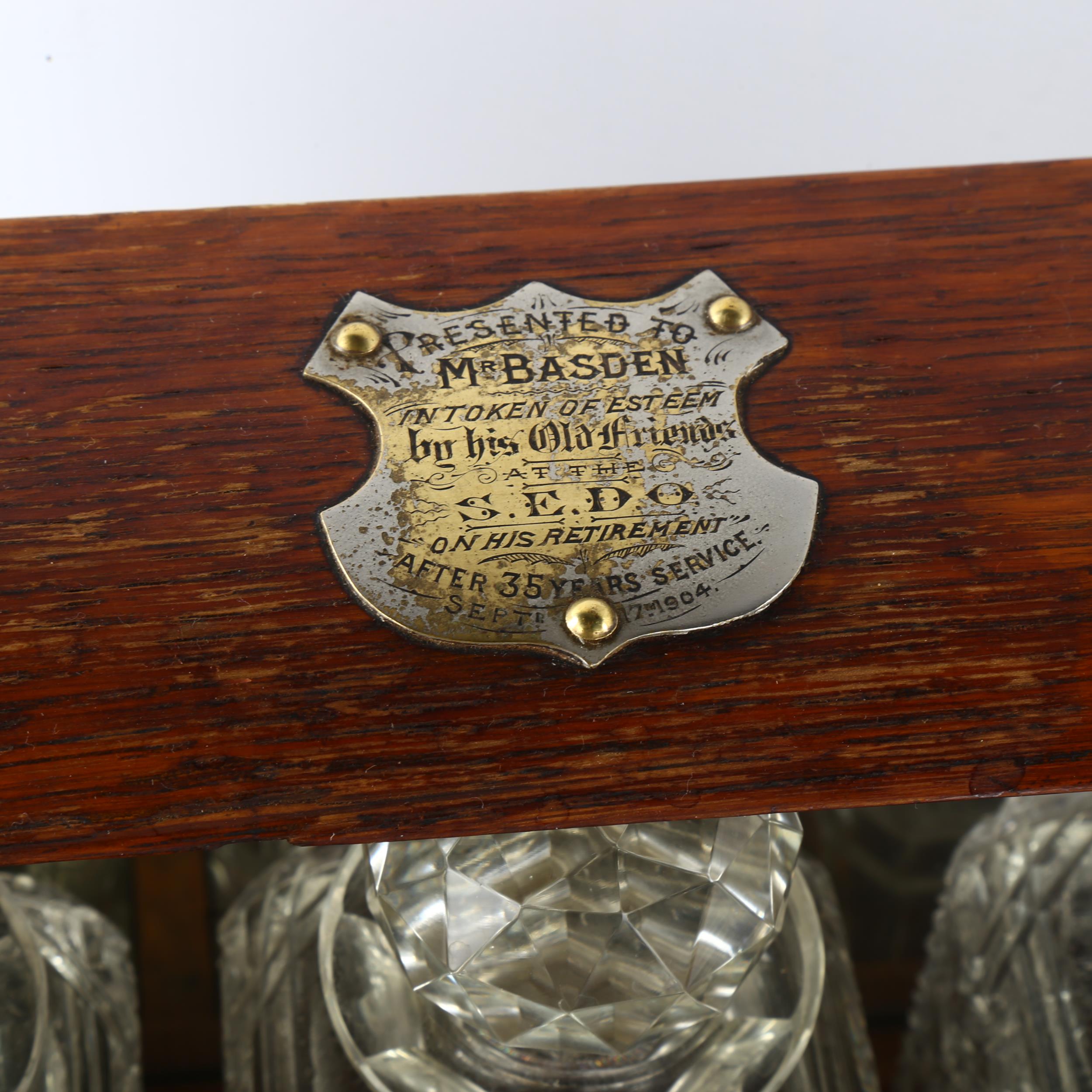 An Edwardian 3 decanter oak tantalus, Gothic metal mounts, with glass cabinet, cribbage board drawer - Image 2 of 3