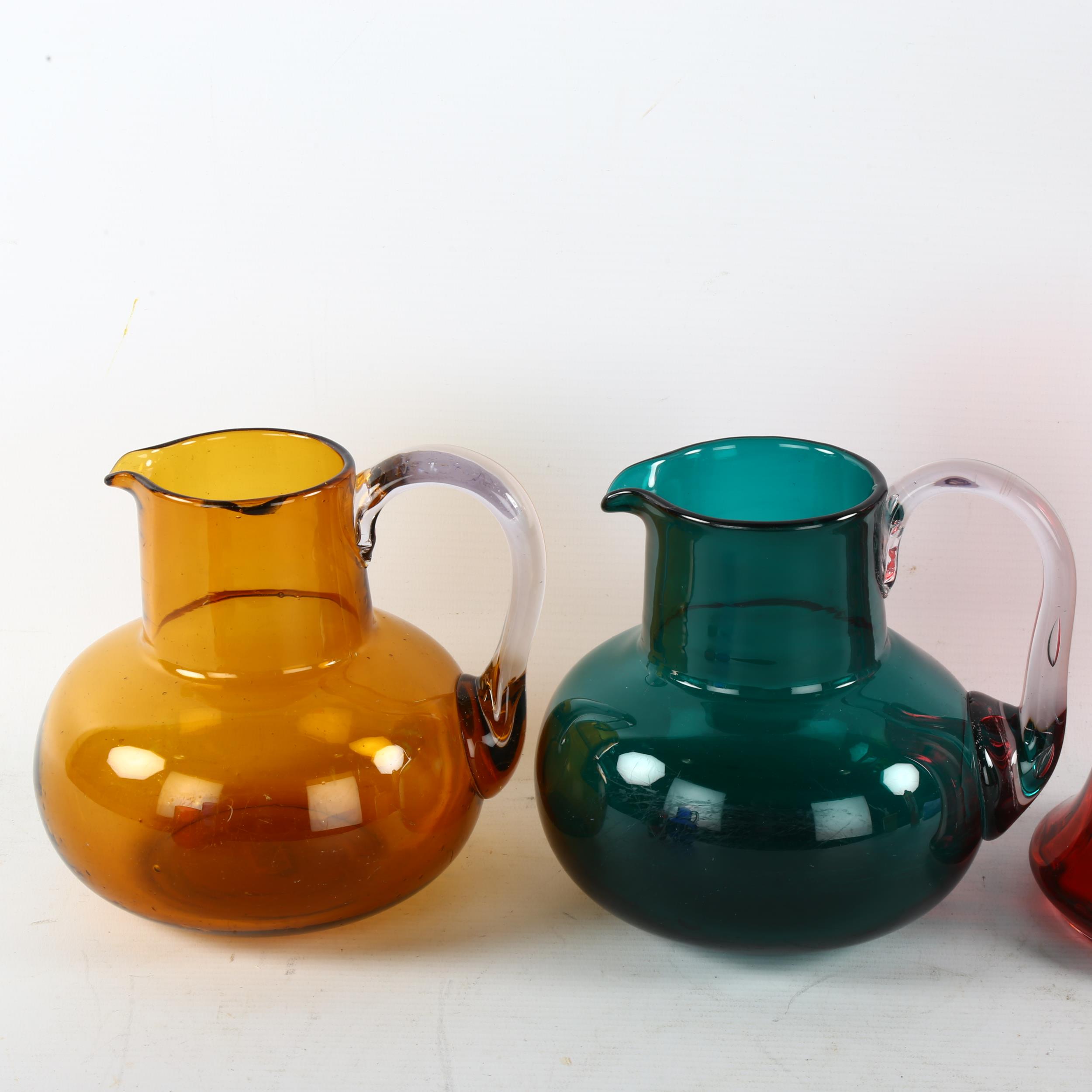 A group of 19th century coloured glassware, largest jug height 18cm (5) Amber coloured glass jug has - Image 2 of 3