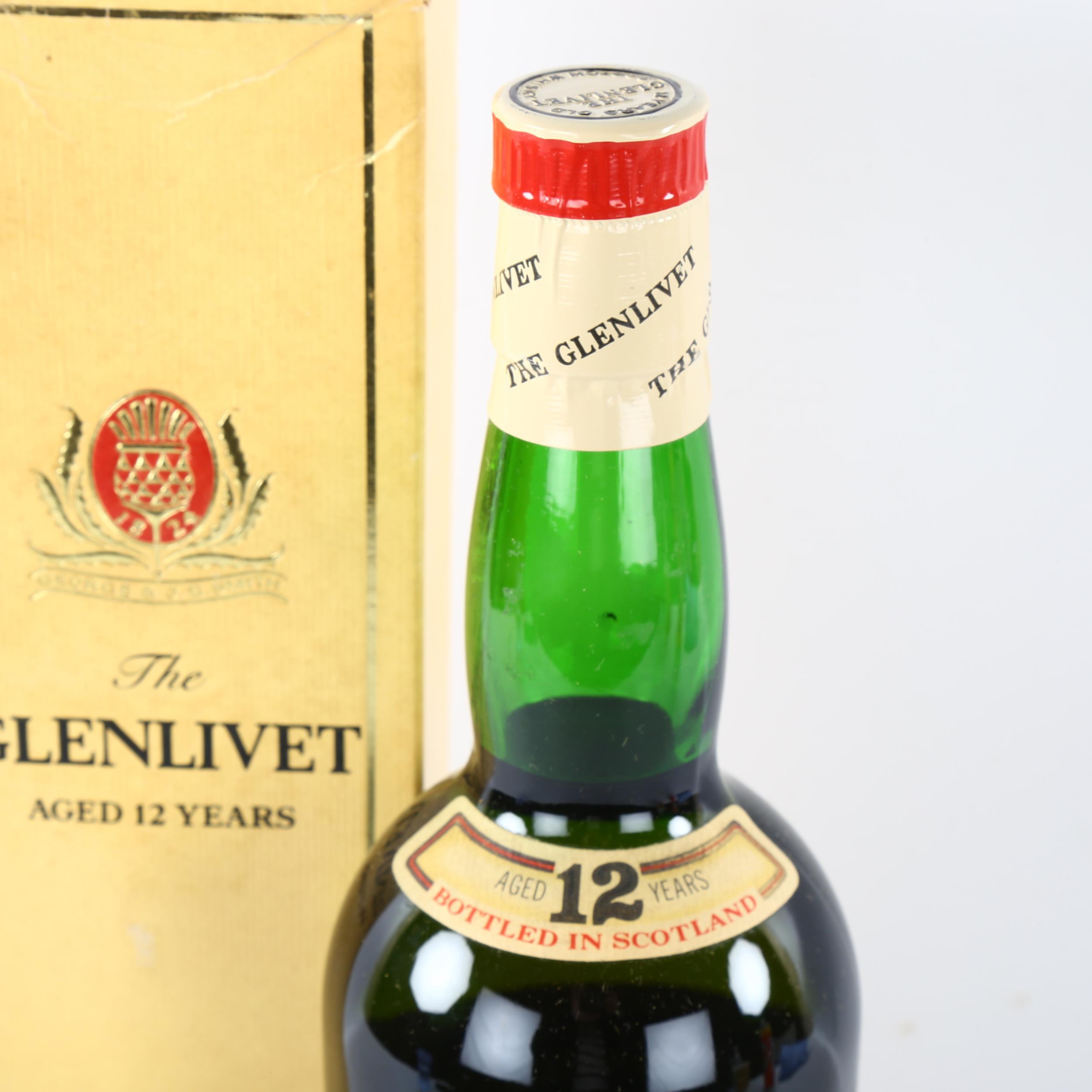 A vintage bottle of The Glenlivet 12 year old single malt whisky, 26 2/3 Fl oz, 70% proof Some - Image 2 of 3