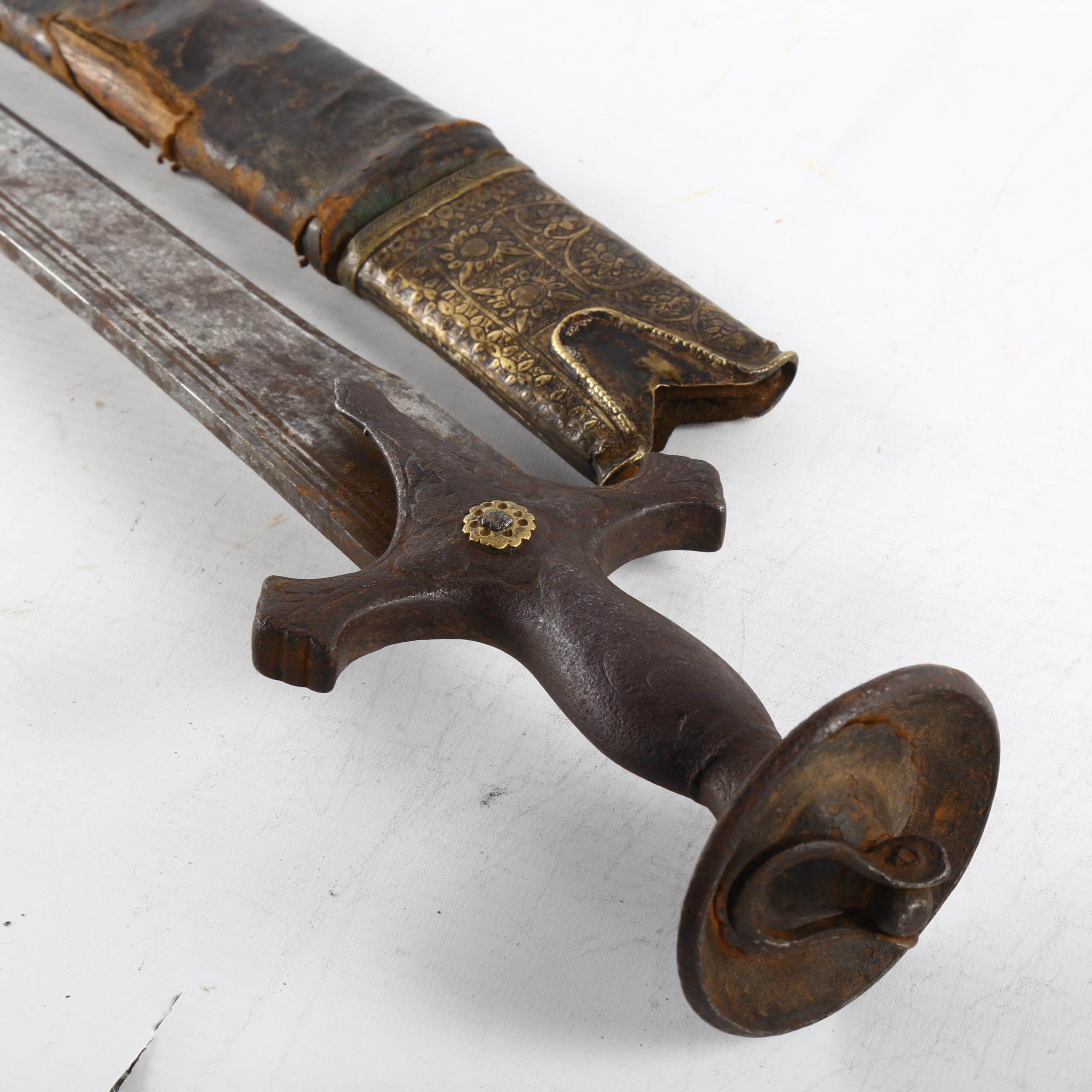 An 18th/19th century Indian Talwar in leather bound wooden scabbard, length 97cm Hilt rocks slightly - Image 3 of 3