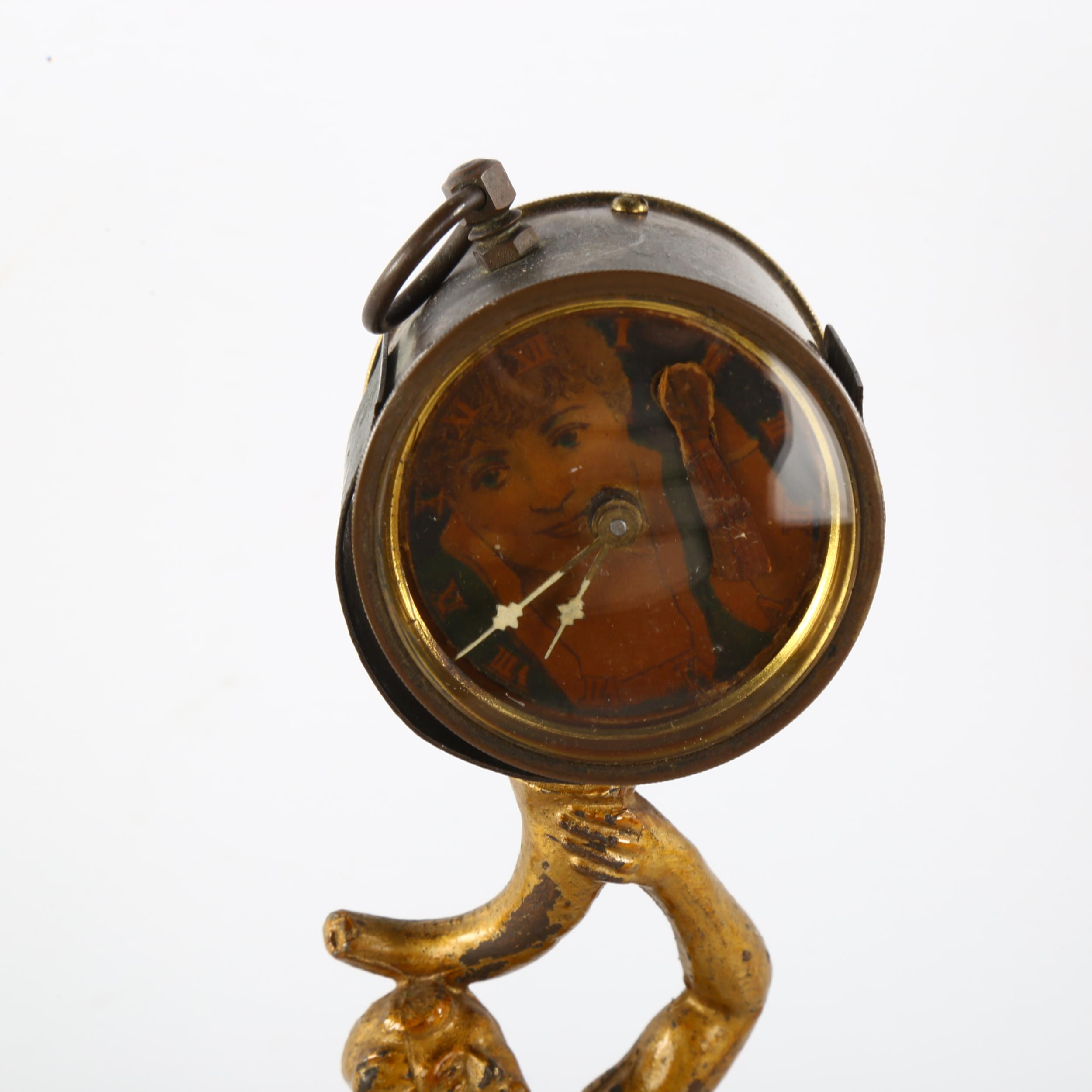 A 19th century novelty clock, supported by gilt-metal figure, height 27cm Gilding on figure is - Image 3 of 3