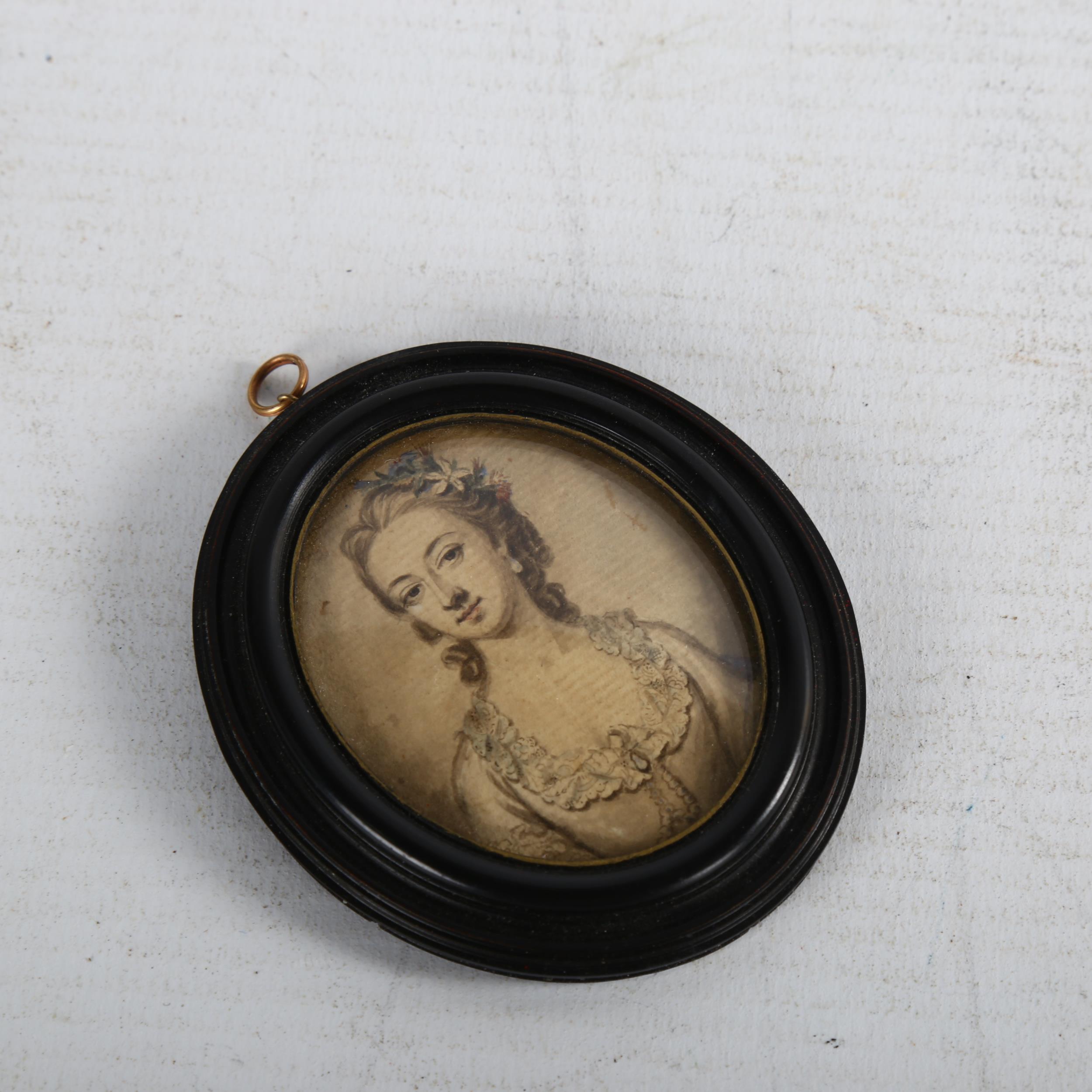 An 18th century miniature watercolour on paper, half length portrait of a lady, unsigned in - Image 3 of 3