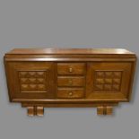 CHARLES DUDOUYT, a 1940s' oak sideboard, 3 central drawers and 2 shelved cupboards, 190 x 50cm,