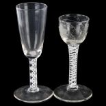 An Antique cordial glass with milk twist stem, height 15.5cm, and a glass with multi milk twist stem