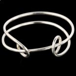 A modern handmade sterling silver abstract bangle, by Claude Wilkes, hallmarks London 2018, internal