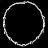 A modern handmade sterling silver ball and wirework necklace, by Claude Wilkes, hallmarks London