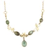 A 9ct gold green tourmaline fringe necklace, set with oval cabochon tourmaline, necklace length