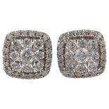 A pair of 14ct white gold diamond cluster earrings, set with modern round brilliant-cut diamonds and