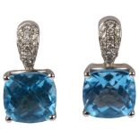 A pair of 18ct white gold blue topaz and diamond earrings with stud fittings, earring height 13mm,