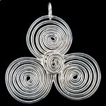 A large modern handmade sterling silver swirl abstract pendant, by Claude Wilkes, hallmarks London